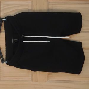 Black long sweatpant material shorts with pockets; worn 2x